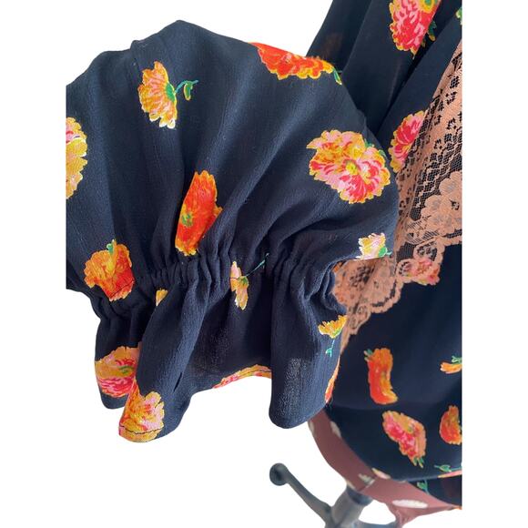 FREE PEOPLE INTIMATELY BLACK FLORAL LONG SLEEVE LACE & RUFFLE SNAP BODY SUIT - Picture 4 of 8